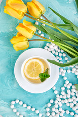 White cup of tea with lemon Flat lay.
