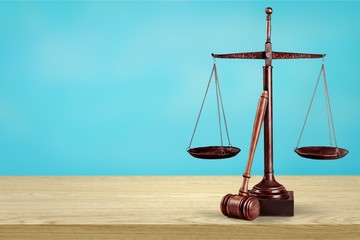 Law scales on table background. Symbol of justice