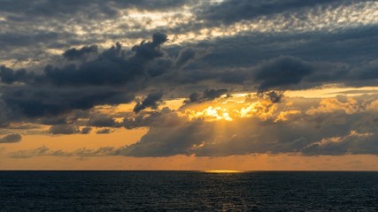 Beautiful sunset over the ocean and sunshine
