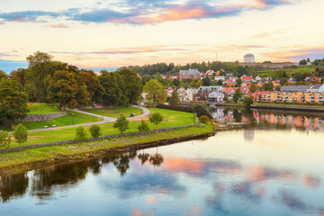 River Nidelva in Trondheim during colorful sunset in September 