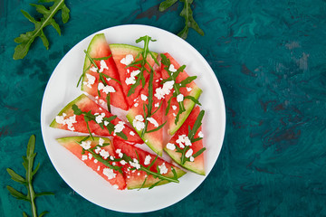 Fresh summer watermelon salad with feta cheese and arugula