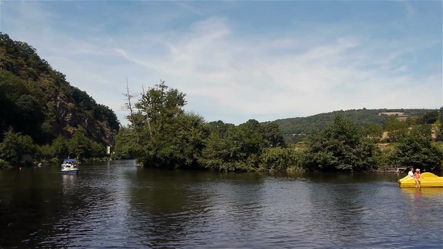 River, boats and kayak in Clecy, Normandy France