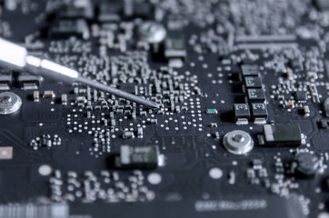 Fototapeta premium Circuit board and electronic computer hardware, Repair of electronic control panel, motherboard.