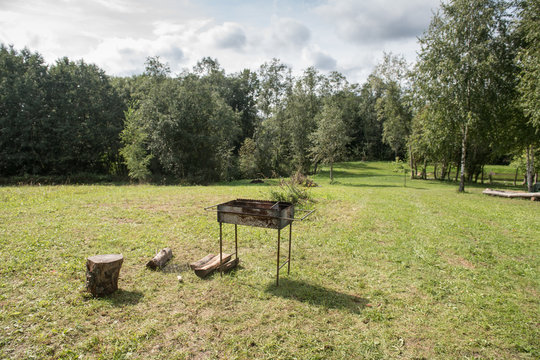 Firewood and brazier in countryside