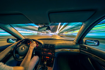 Night city road view from inside car
