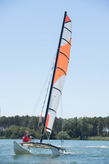 sailing on a lake - summer and sports theme