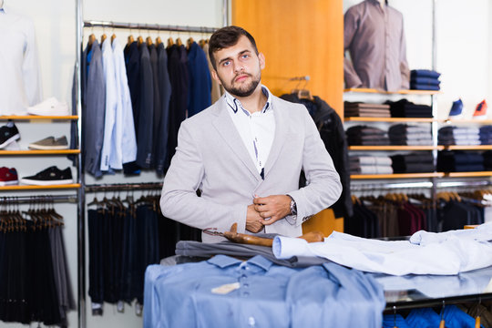  customer  choosing casual jacket