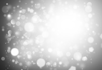 Gray glitter sparkles rays lights bokeh Festive Elegant abstract background.