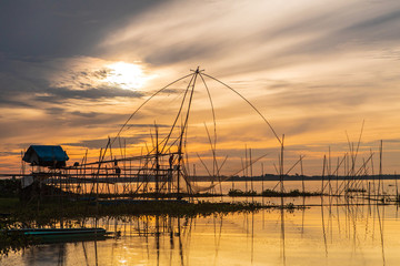 Fototapeta na wymiar Fishing tools of fisherman in the morning at Huai Luang dam, Udonthani province, Thailand.