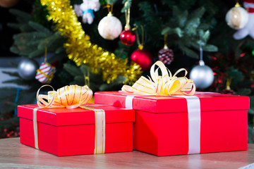 Fototapeta na wymiar Two red Christmas gifts