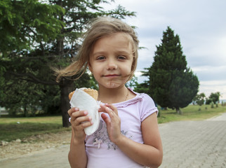 girl eating ice cream on vacation