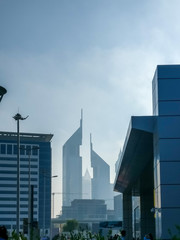 Obraz premium Dubai, UAE - September 29, 2017: an Epic shot of Dubai twin towers on Sheikh Zayed Road from the trade center