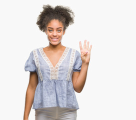 Young afro american woman over isolated background showing and pointing up with fingers number four while smiling confident and happy.