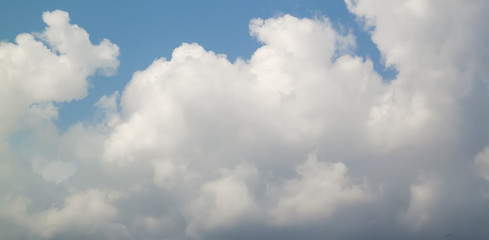 beautiful white clouds on blue sky background