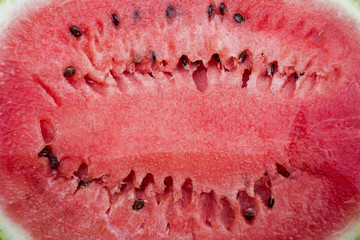 Ripe, juicy, red, sweet, flesh watermelon close-up. Watermelon background.
