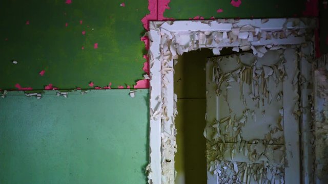 Old frame of a door inside a abandoned house