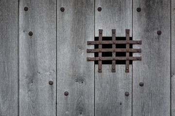 A Metal Grate Covering a Small Opening in Mont Saint Michel, France