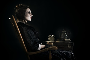 Obraz na płótnie Canvas Ghostly woman in the rocking chair