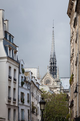 Notre Dame Catherdral Glimpsed between Buildings in the 5th Arrondissement of Paris