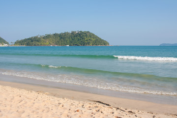 Sea water, wave, mountains and sand