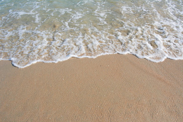 Fototapeta na wymiar Sea water, sand and wave