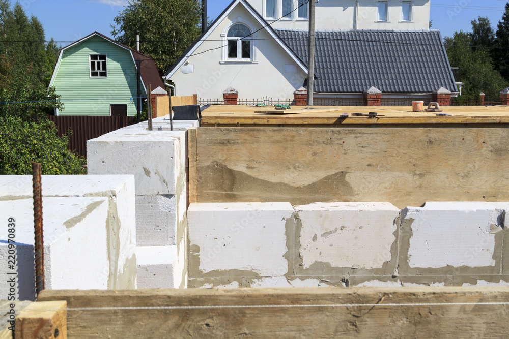 Poster top view of the building floor between the floors in the country house under construction from the foam block