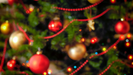 Blurred background for winter celebrations with decorated Christmas tree