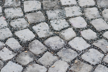 Close up of grey Cobblestones , repeating pattern
