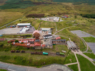 An aerial view of an Old Coal Mine Pit Yard on overcast Day, Blaenavon, Wales