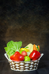 Fototapeta na wymiar vegetables and fruits in wicker basket