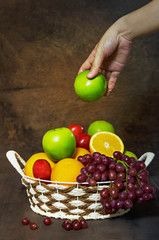 vegetables and fruits in wicker basket