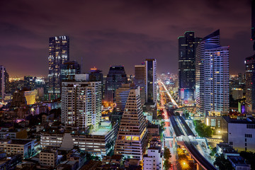 Obraz na płótnie Canvas night light urban cityscape skyline in metropolis