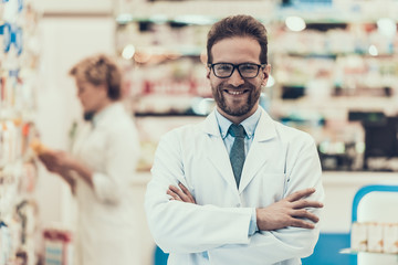 Portrait Smiling Pharmacist Working in Drugstore