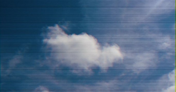View from below of perfect cloud in the blue sky - glitch transmission effect of distorted signal