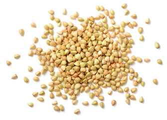 uncooked buckwheat isolated on the white background, top view