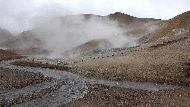 Iceland. A characteristic feature of the country is wind-blown vapour of active fumaroles.