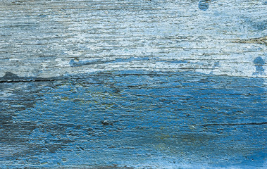 Rustic dark blue painted wood texture as background.