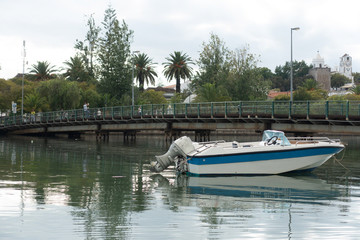 Fototapeta na wymiar small motorboat moored