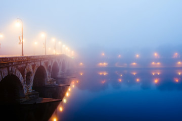 Winter morning mist in Toulouse, France. View to Pont Neuf (New Bridge) at Garonne river.