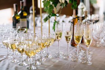 Festive table setting with champagne. champagne glasses close up