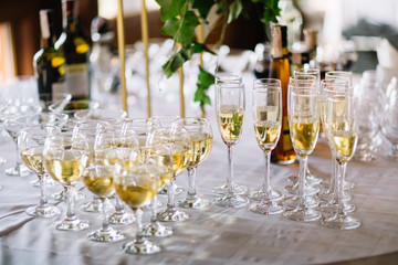 Festive table setting with champagne. champagne glasses close up