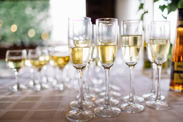 Festive table setting with champagne. champagne glasses close up