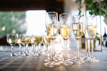 Festive table setting with champagne. champagne glasses close up