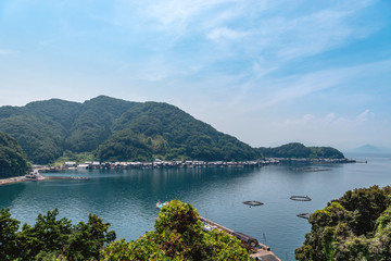 Fototapeta na wymiar 美しい伊根湾と舟屋の風景