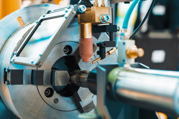 The machine for welding surfacing cylindrical parts.