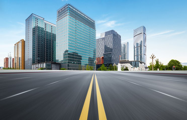 The expressway and the modern city skyline are in Chongqing, China.