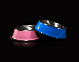 Pet bowl stainless on isolated black.  Pet supplies concept