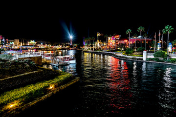 ORLANDO, FLORIDA, USA - DECEMBER, 2017: Highlights of Universal Studios entrance to the theme park at night