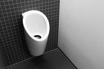 Design urinal for men, New modern European black toilet for men, Elegant men's toilet with ceramic urinal and gray washable surface - 220988033