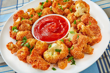 baked Breaded cauliflower with tomato sauce
